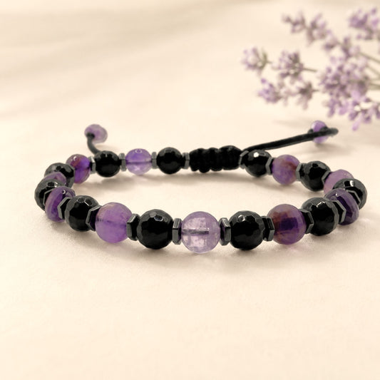 Personalized Amethyst and Black Onyx Bracelet with Hematite Accents, Adjustable Waterproof Gemstone Bracelet for Women, Handmade Purple Amethyst Crystal Jewelry with Black Onyx Beads and Optional Initial Charm. This elegant beaded bracelet features genuine faceted amethyst gemstones, polished black onyx stones, and hematite spacer beads on a durable adjustable black cord. Lightweight, comfortable, and waterproof for everyday wear, this handmade bracelet makes a meaningful birthday gift for any woman.