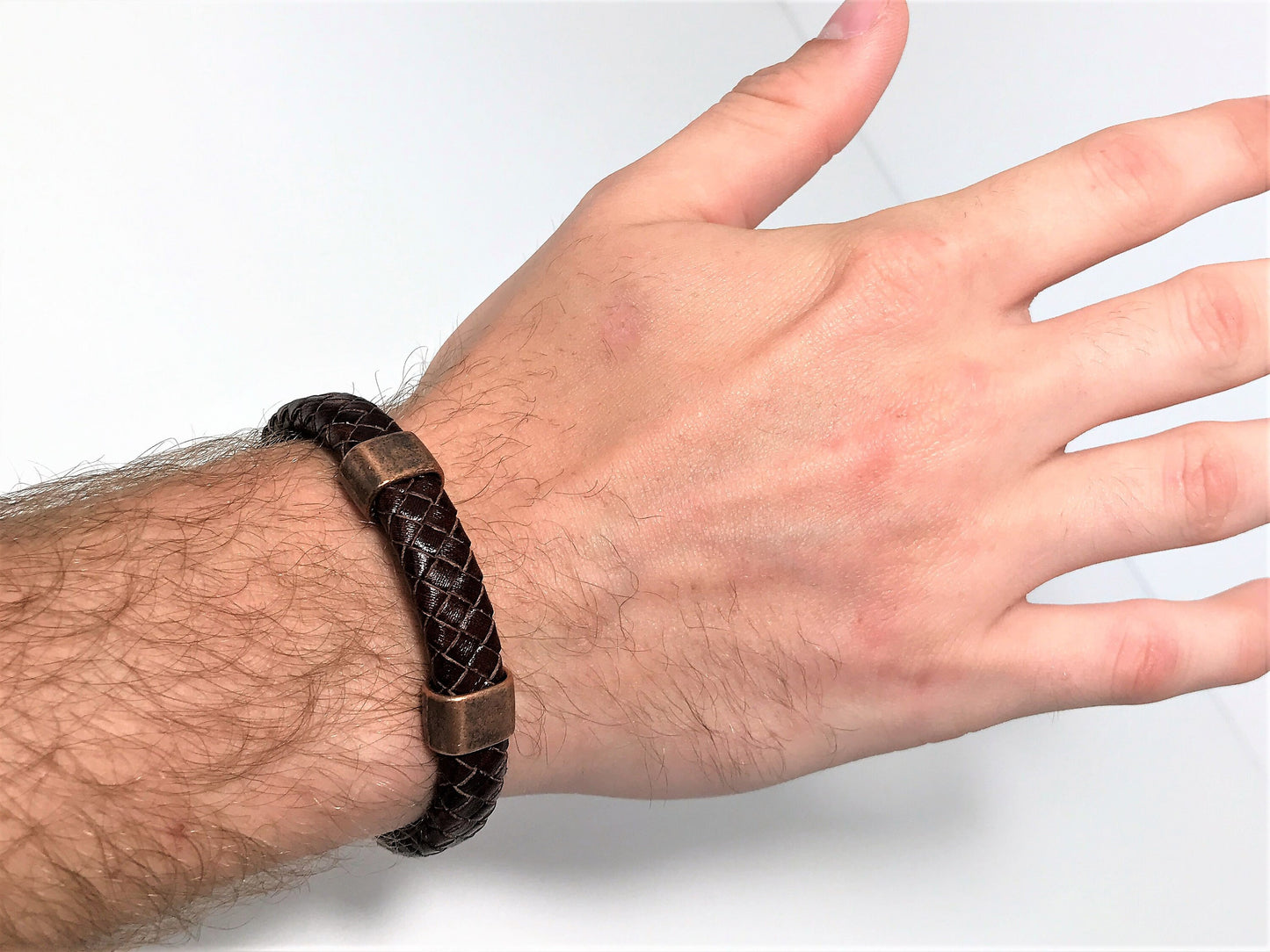 Man wearing a bracelet on the wrist. Perfect snag fit.