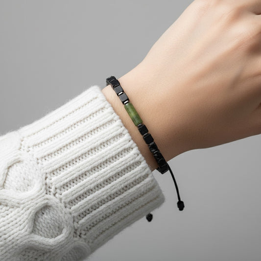 Woman wearing an adjustable green jade and matte black cubic 