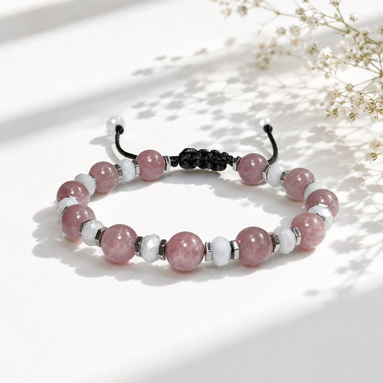 Handmade Rose Quartz and Aquamarine gemstone bracelet for women featuring genuine natural Rose Quartz beads, faceted Aquamarine gemstones, and polished Hematite accents on a durable waterproof adjustable cord. Personalized with an optional initial charm for a custom touch. Elegant minimalist crystal bracelet for everyday wear, bridesmaids, birthdays, anniversaries, Mother's Day, Valentine's Day, weddings, friendship gifts, self-care, and meaningful jewelry for her.