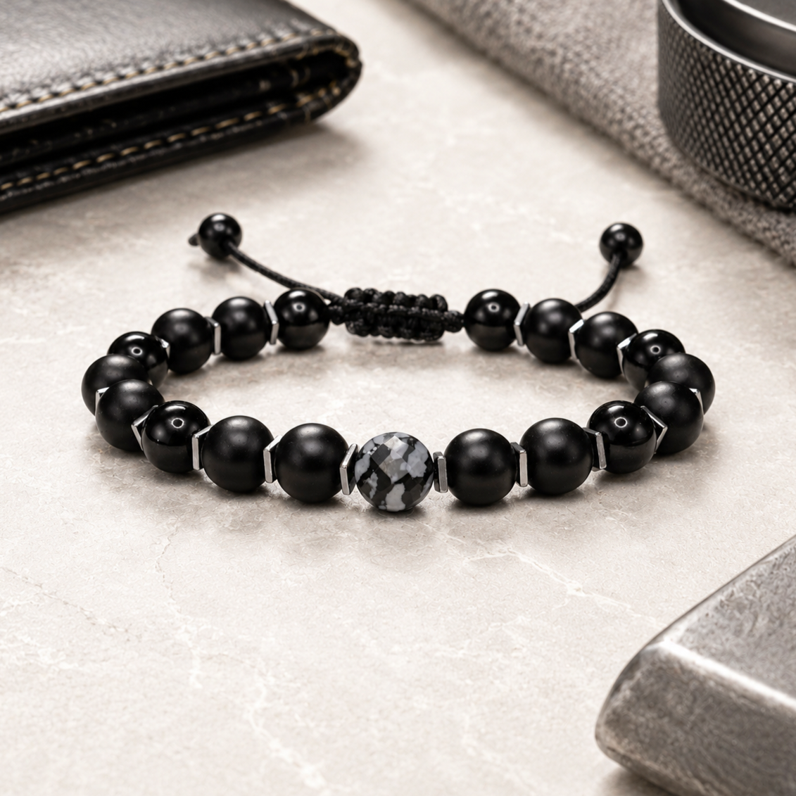 Adjustable Protection Bracelet crafted with Matte Black Onyx, Snowflake Obsidian, and Hematite beads. Perfect for anniversaries, birthdays, or special occasions. Suited for both men and women, the durable Black Onyx is resistant to scratches.