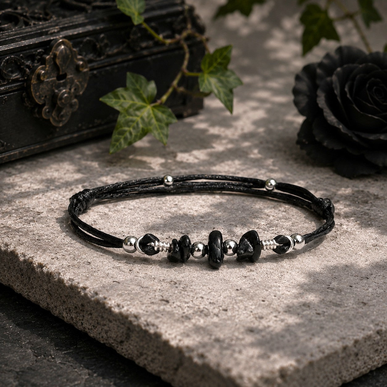 Handcrafted Adjustable Black Gothic Tourmaline Bracelet for Women and Girls. Adorned with natural Tourmaline chips & and stainless steel beads. Personalizable with an Initial Charm. Unique & and stylish, exclusively crafted.
