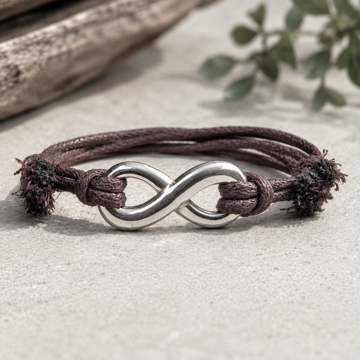 Cotton Cord Adjustable bracelet with Stainless Steel Infinity Charm. Featuring an infinity charm on cotton sliding knots for easy adjustable sizing. Handmade, waterproof. Choose between black or brown cotton cord, Silver or Gold Infinity.