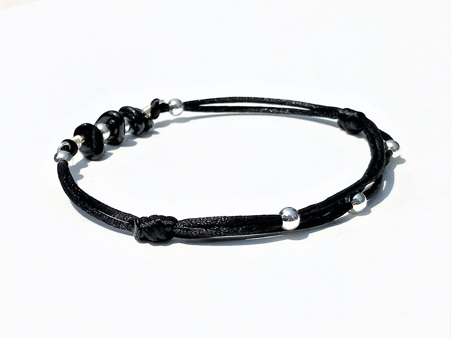 Black Tourmaline Bracelet: Silver Beads, Adjustable Gemstone Jewelry - on model