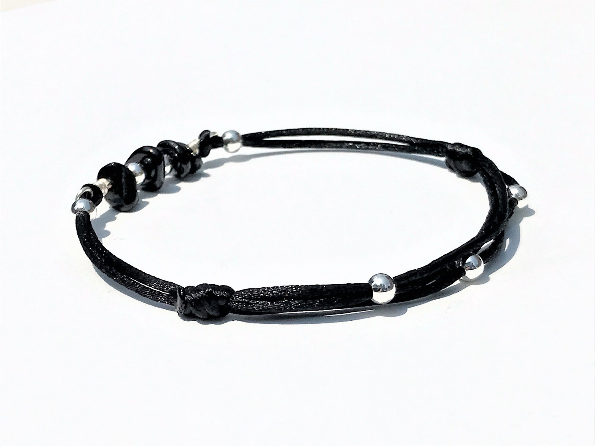 Black Tourmaline Bracelet: Silver Beads, Adjustable Gemstone Jewelry - on model