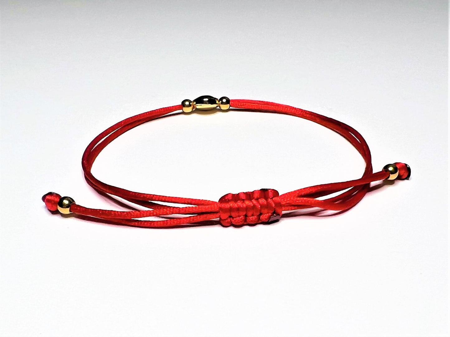 Red String Evil Eye Bracelet - worn view