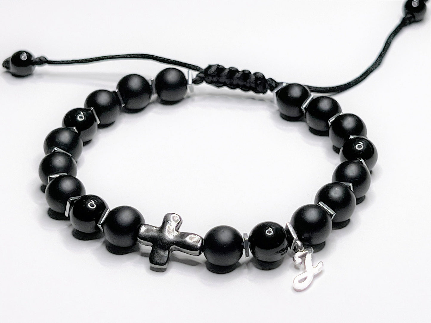 Matte Black Onyx bracelet personalized with one initial letter charm.