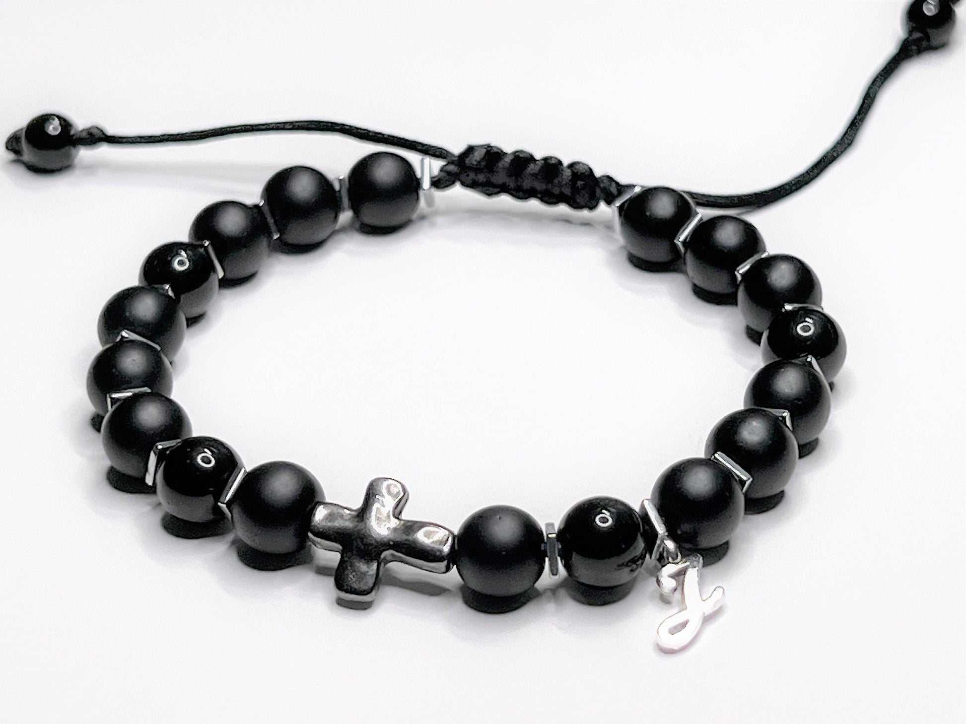 Matte Black Onyx bracelet personalized with one initial letter charm.