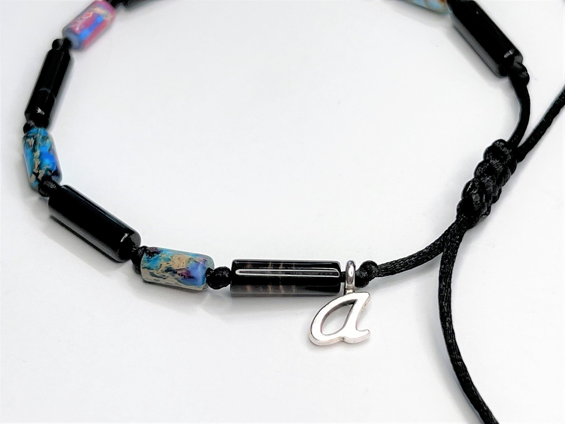 Gemstone tubes Bracelet can be personalized with one initial letter charm of your choice. Choose from A to Z.