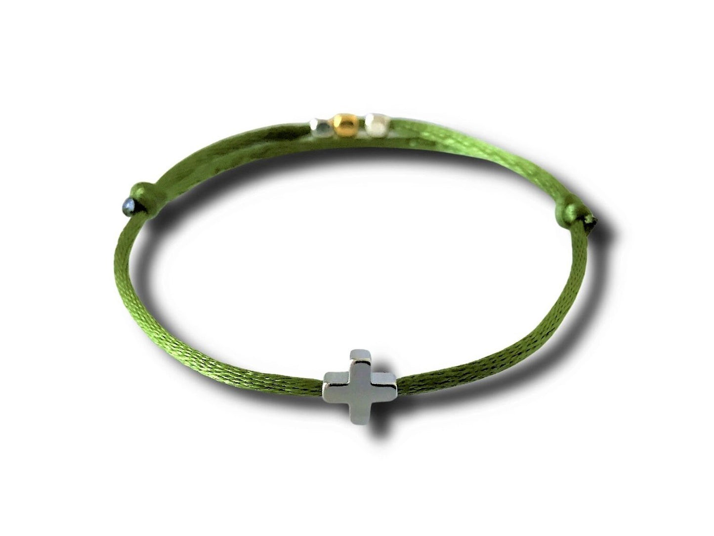 Olive color string bracelet with a white gold cross.