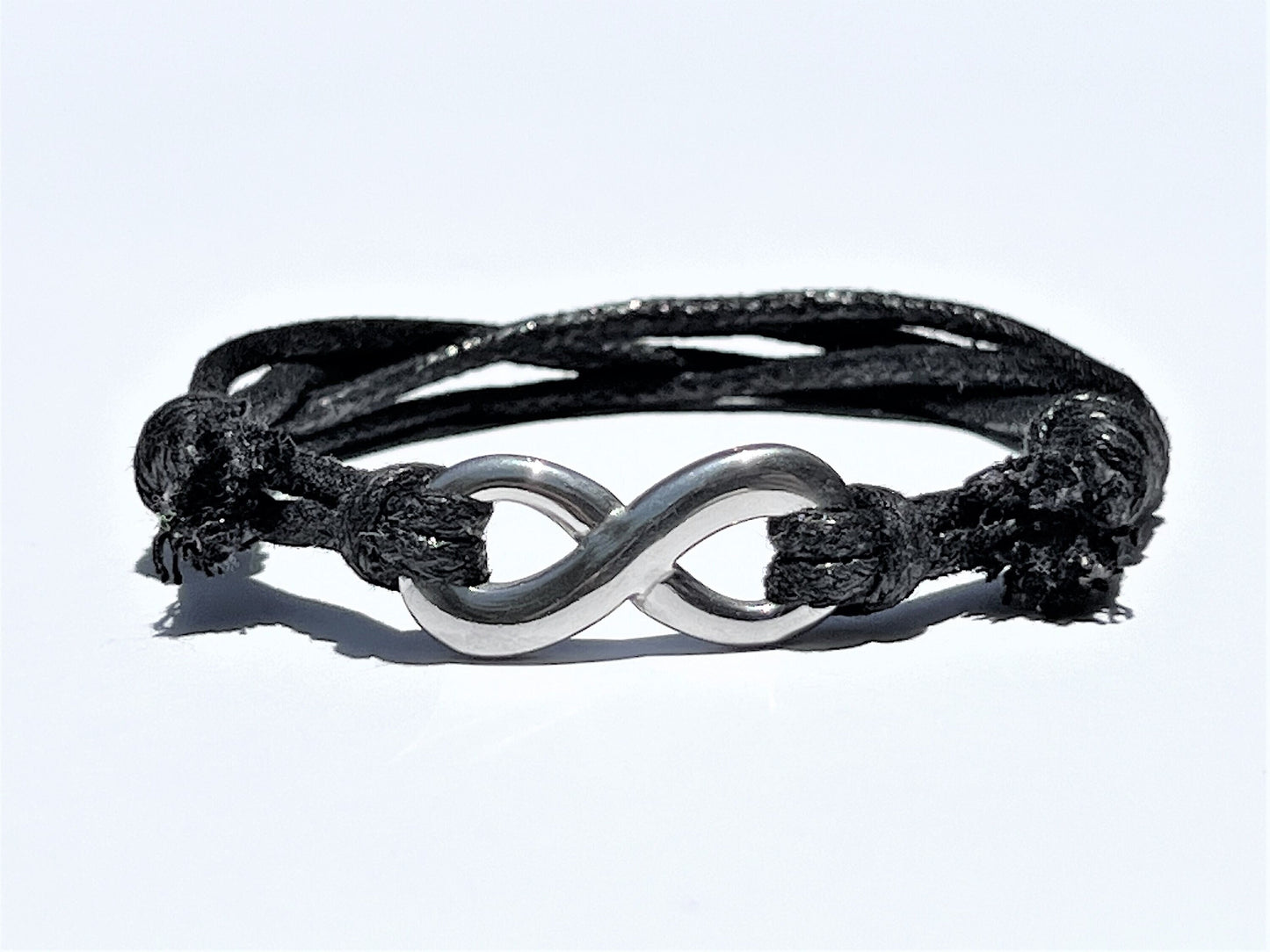 Cotton Cord Infinity Bracelet: Stainless Steel, Adjustable Knot - lifestyle photo
