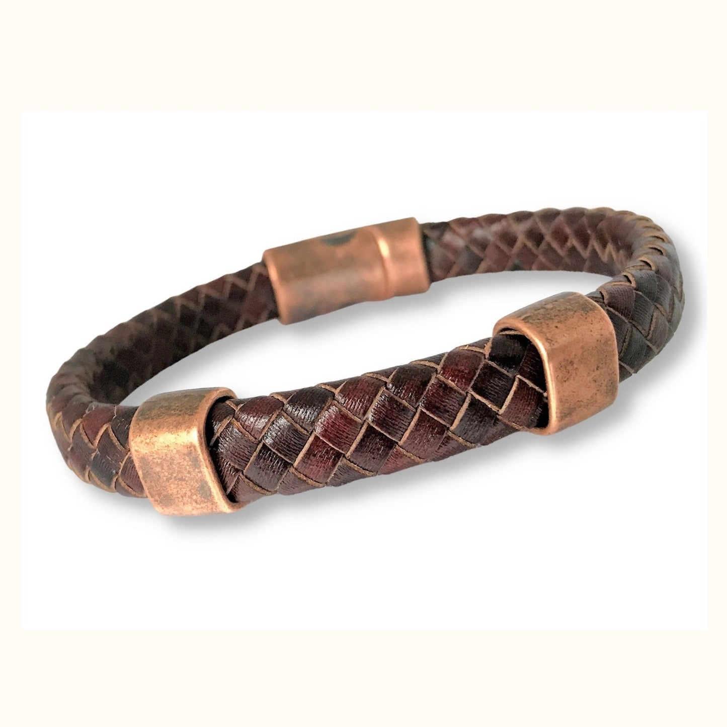 Handcrafted Braided Leather Bracelet with 2 Antique Copper Sliders and Magnetic Clasp. Unisex Style - Ideal for Leather Anniversaries. Personalized Sizes and Handwriting Engraving. Complimentary Gift Box and wrapping Included. Made in Alabama.