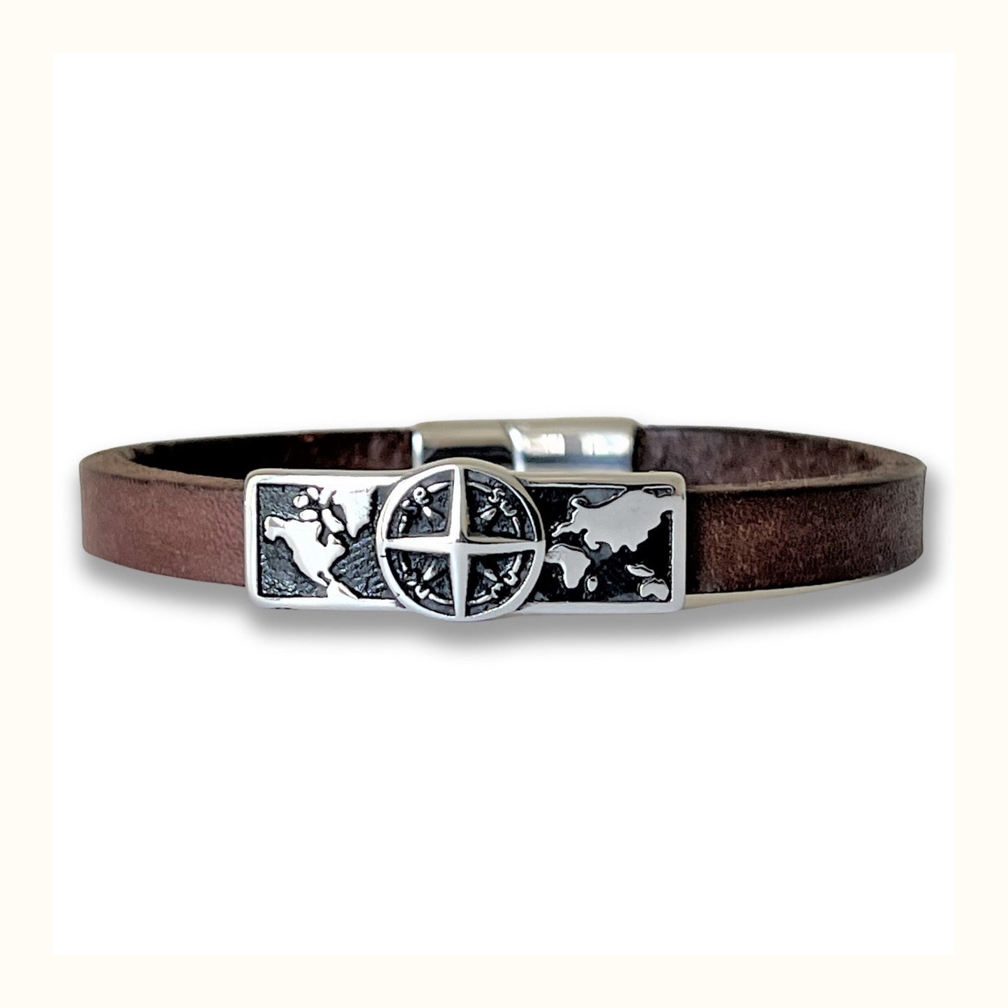 Handmade Brown Leather Bracelet with a Stainless Steel Compass Charm. Dual Magnetic Clasp, Tailored for Both Men & Women. The Perfect Gift for Wanderlust Souls and Leather Anniversaries. Personalized Sizes & Initial Stamping. Crafted in Texas.