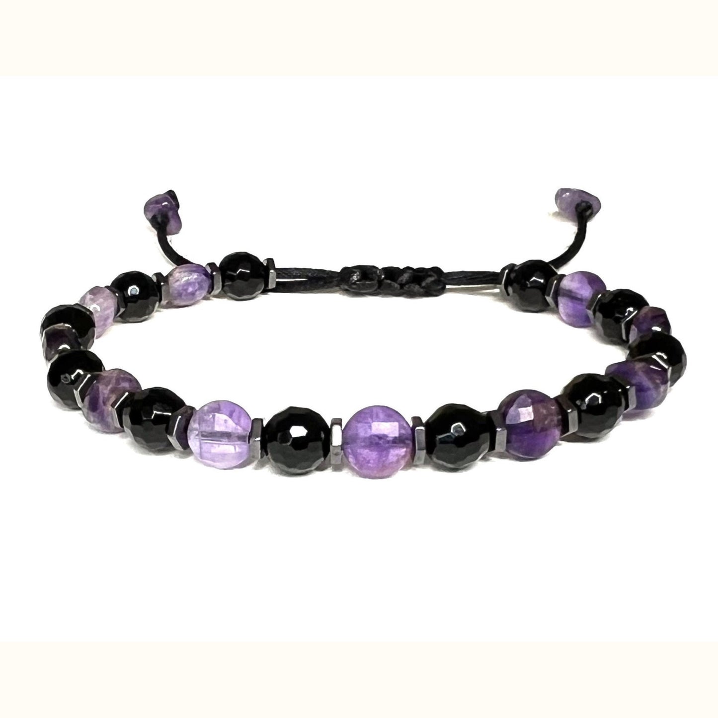 Adjustable Amethyst and black Onyx Bracelet features a waterproof design, 6mm faceted natural gemstones, and hematite accents for daily wear. It's believed to aid emotional healing, promote tranquility, and enhance spiritual awareness.