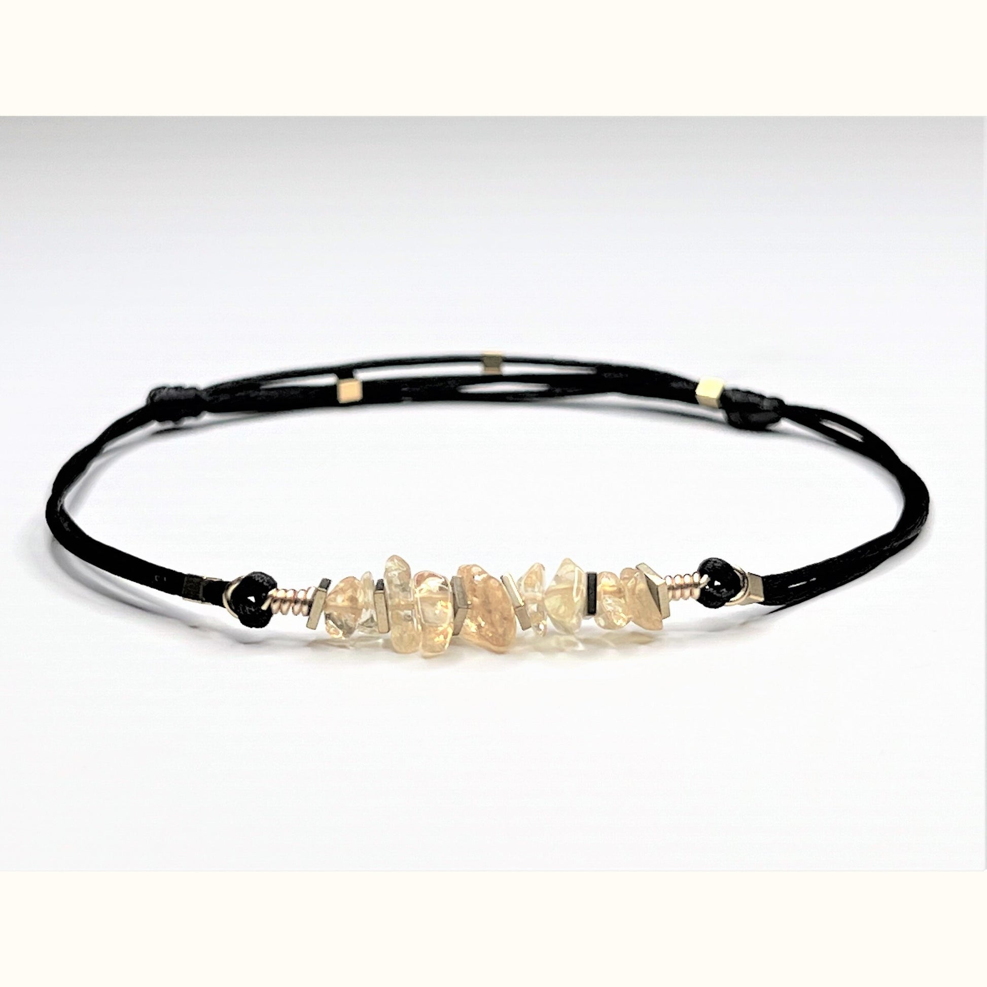 Adjustable Casual Citrine Anklet with Natural Citrine Chips on black nylon string. I added tiny gold flat square Hematite beads for extra sparkling. The ankle bracelet is adjustable and waterproof. Easy to put it on and take it off