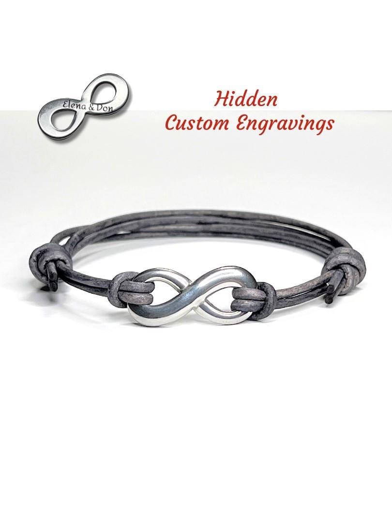 Handmade brown distressed leather bracelet featuring a smooth genuine leather cord and a polished stainless steel infinity charm about 1 inch long. The adjustable sliding knot ensures a perfect fit, and back engraving adds a personal, meaningful touch — an ideal gift for him or her.
