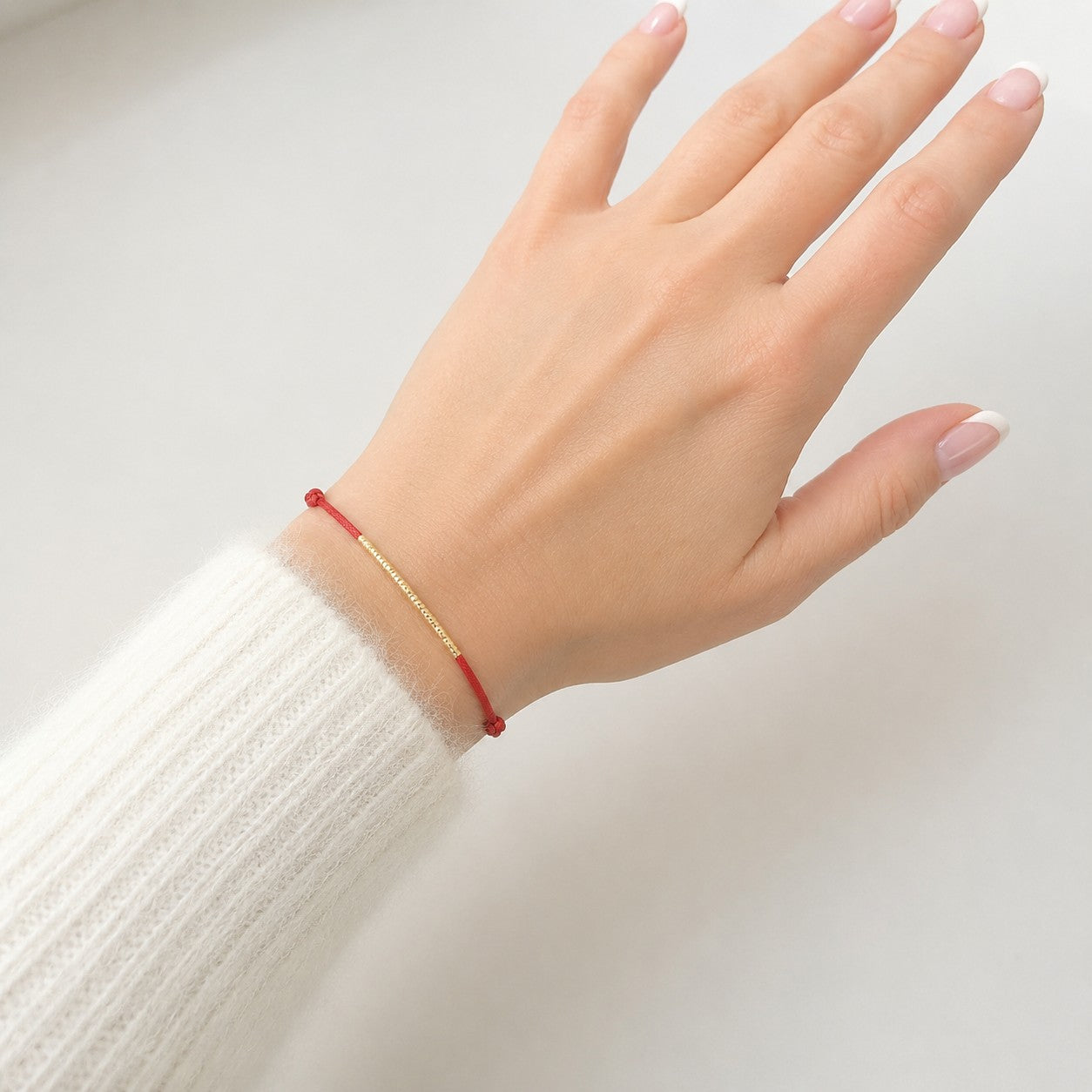 Red String Bracelet with Gold Tube, Adjustable Friendship Bracelet, Waterproof Everyday Cord... - worn view